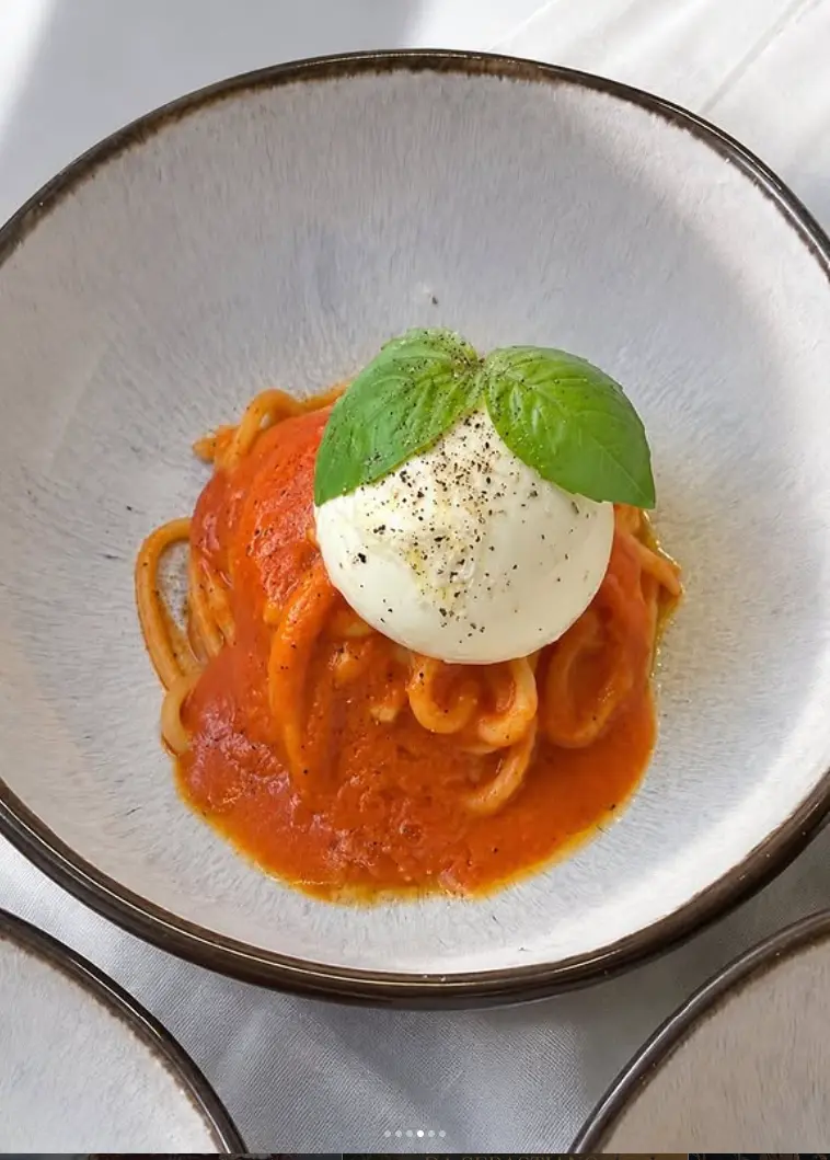 Pasta with tomato and burrata